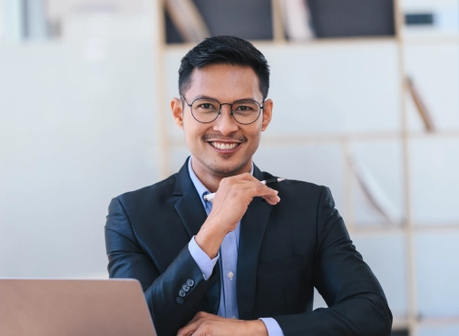 portrait-of-young-smart-businessman-working.webp